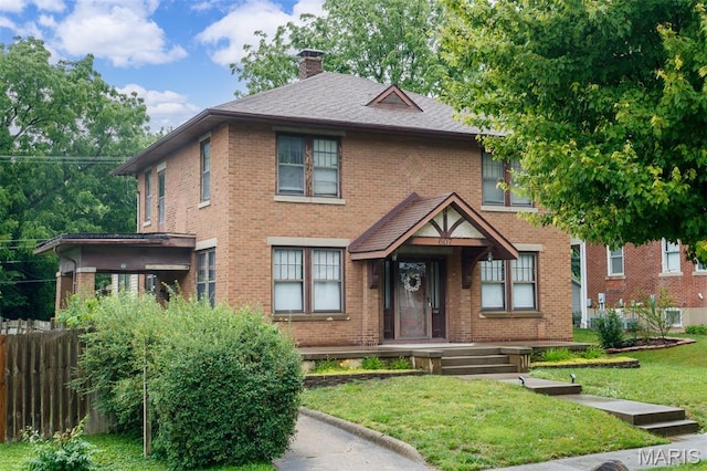 607 9th St, Highland, IL 62249 - view of front of home featuring a chimney and brick siding