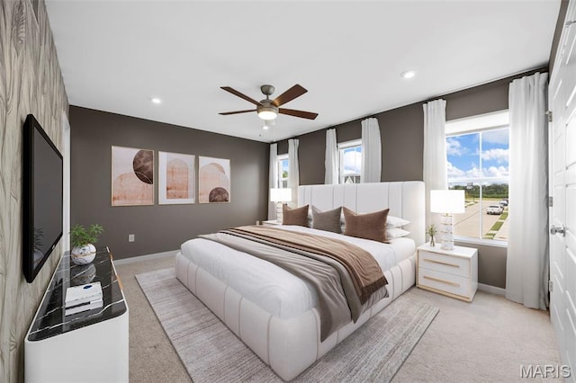 357 Newbridge Way, Ofallon, MO 63368 - bedroom featuring light carpet, multiple windows, baseboards, and recessed lighting