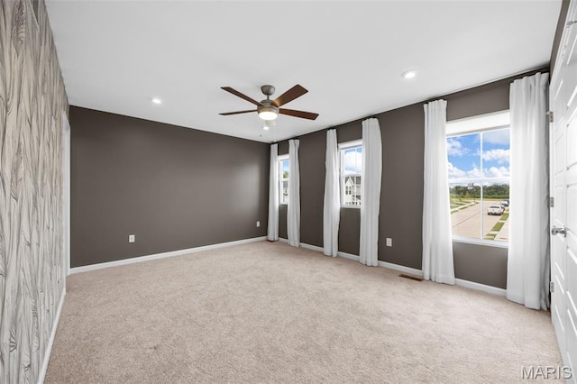 357 Newbridge Way, Ofallon, MO 63368 - empty room featuring a ceiling fan, carpet floors, recessed lighting, and baseboards