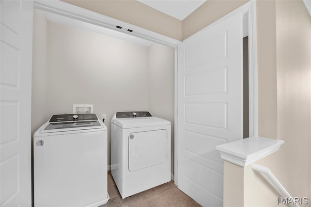 357 Newbridge Way, Ofallon, MO 63368 - laundry area featuring washer and dryer and light tile patterned floors
