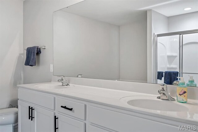5034 Corisande Woods Dr, Fenton, MO 63026 - full bathroom with double vanity and a shower with door