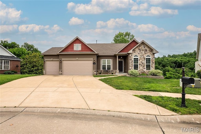 1630 Twin Oaks Dr, Arnold, MO 63010 - craftsman-style home featuring stone siding, a front yard, an attached garage, and concrete driveway