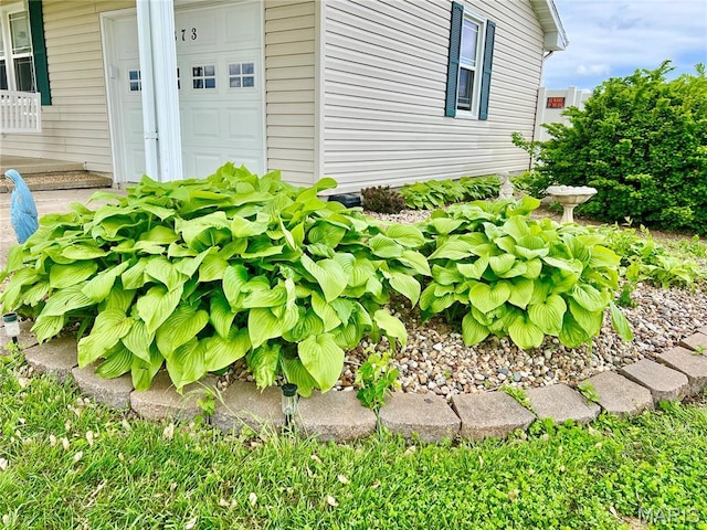 873 White Rd, Montgomery City, MO 63361 - doorway to property featuring an attached garage