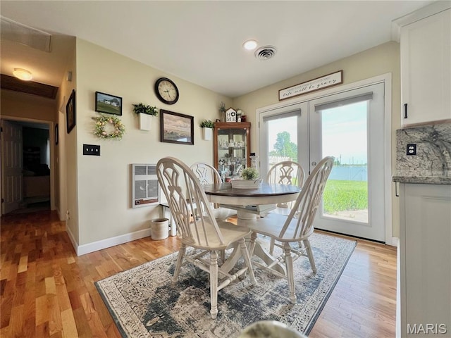 873 White Rd, Montgomery City, MO 63361 - dining space featuring light wood-style floors, heating unit, french doors, and recessed lighting