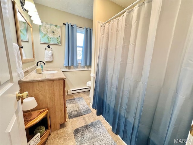 873 White Rd, Montgomery City, MO 63361 - full bathroom featuring a baseboard radiator, vanity, and curtained shower