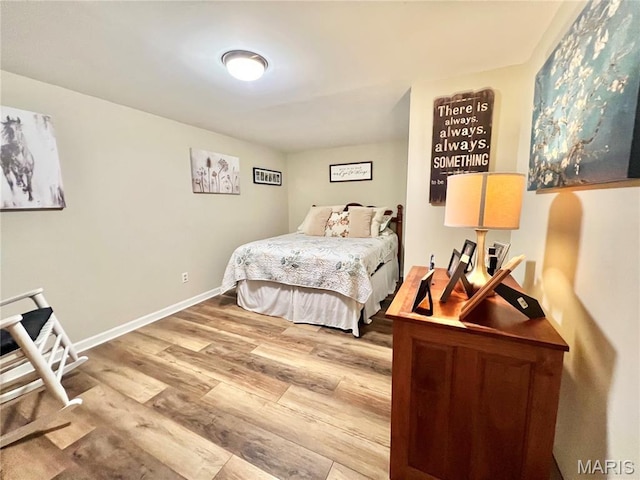 873 White Rd, Montgomery City, MO 63361 - bedroom featuring light wood finished floors and baseboards