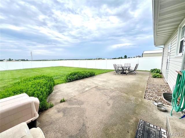 873 White Rd, Montgomery City, MO 63361 - fenced backyard featuring a patio and outdoor dining space