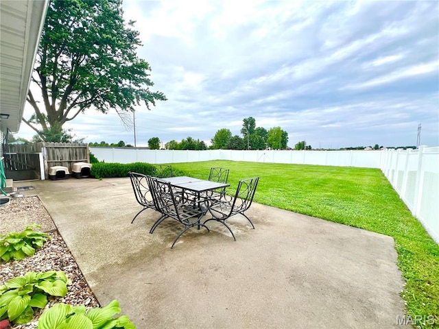 873 White Rd, Montgomery City, MO 63361 - fenced backyard with a patio area and outdoor dining area