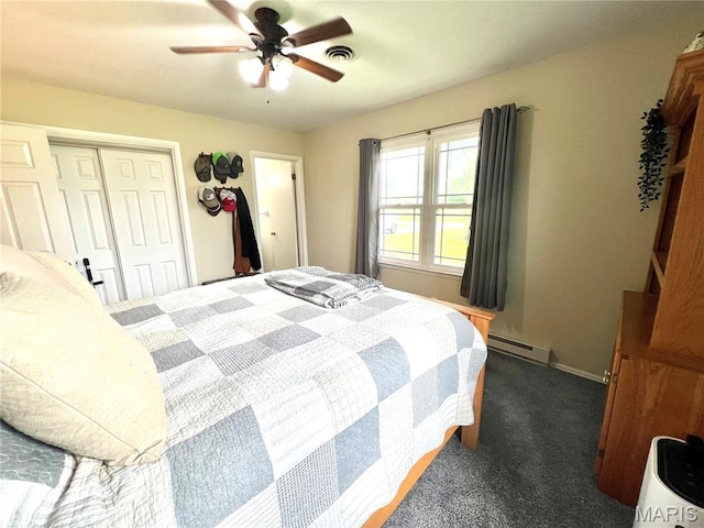 873 White Rd, Montgomery City, MO 63361 - bedroom featuring dark colored carpet, a baseboard radiator, a closet, and ceiling fan