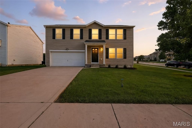 429 Red Coat Trl, Wentzville, MO 63385 - traditional-style house with a garage, a lawn, and driveway