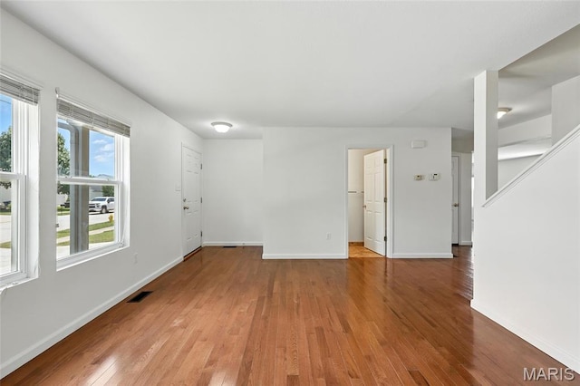 429 Red Coat Trl, Wentzville, MO 63385 - unfurnished room featuring wood finished floors