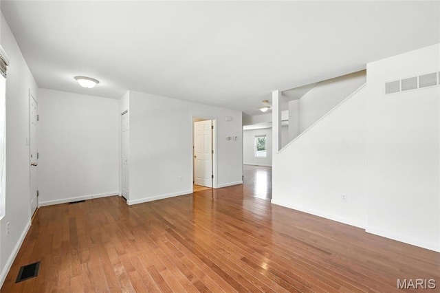 429 Red Coat Trl, Wentzville, MO 63385 - empty room featuring hardwood / wood-style floors and baseboards