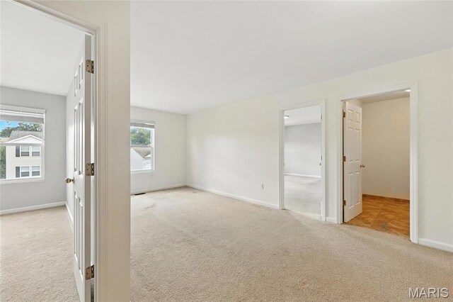 429 Red Coat Trl, Wentzville, MO 63385 - carpeted empty room featuring baseboards