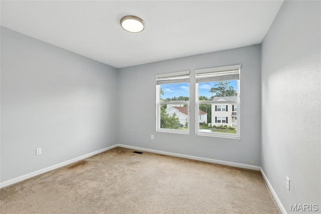 429 Red Coat Trl, Wentzville, MO 63385 - carpeted empty room featuring baseboards