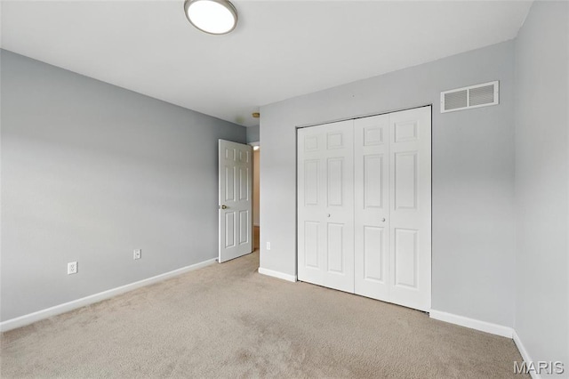 429 Red Coat Trl, Wentzville, MO 63385 - unfurnished bedroom featuring carpet floors and a closet
