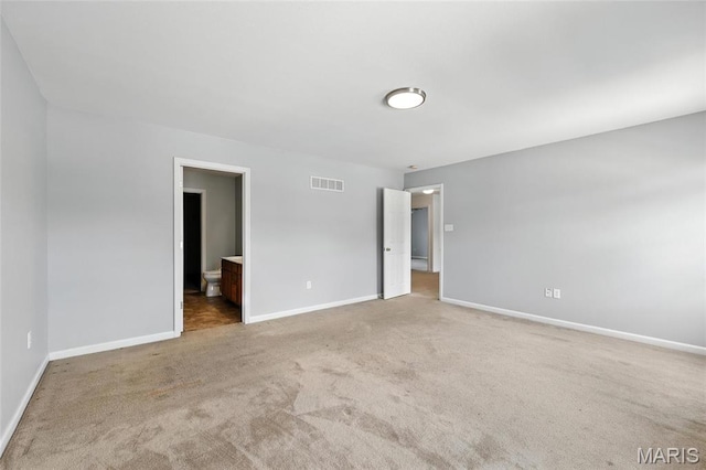 429 Red Coat Trl, Wentzville, MO 63385 - unfurnished bedroom featuring carpet and connected bathroom