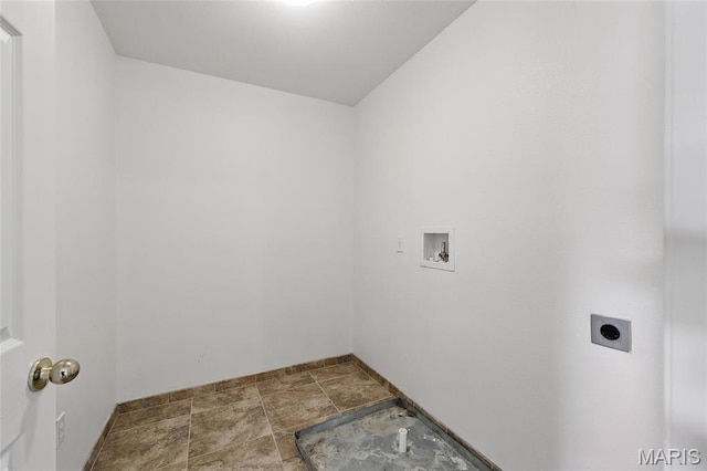 429 Red Coat Trl, Wentzville, MO 63385 - washroom with hookup for an electric dryer, stone finish flooring, and washer hookup