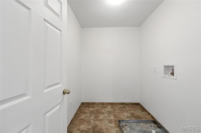 429 Red Coat Trl, Wentzville, MO 63385 - washroom with washer hookup and stone finish flooring