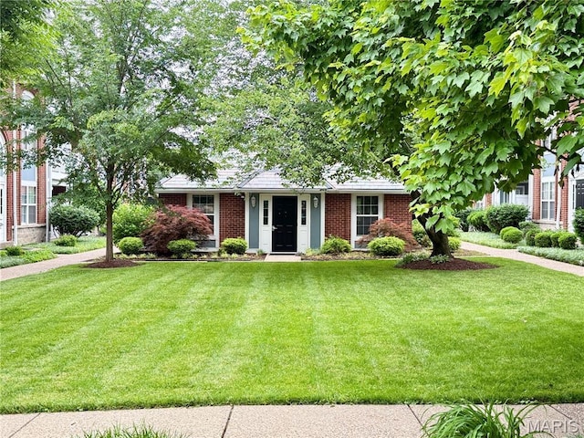 4235 W Pine Blvd Unit 21, Saint Louis, MO 63108 - view of front of home with a front lawn and brick siding