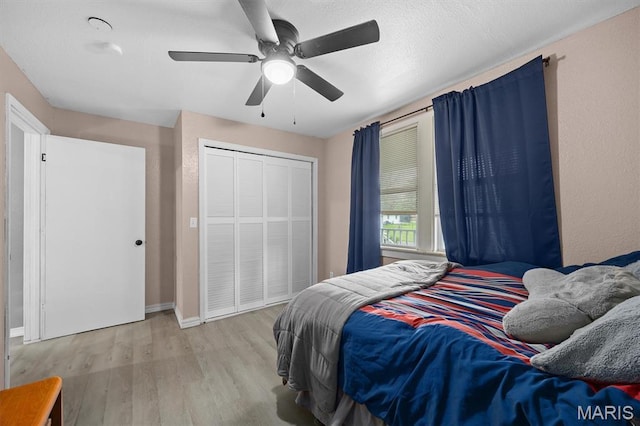 203 N Williams St, Albers, IL 62215 - bedroom featuring wood finished floors, a closet, ceiling fan, and baseboards