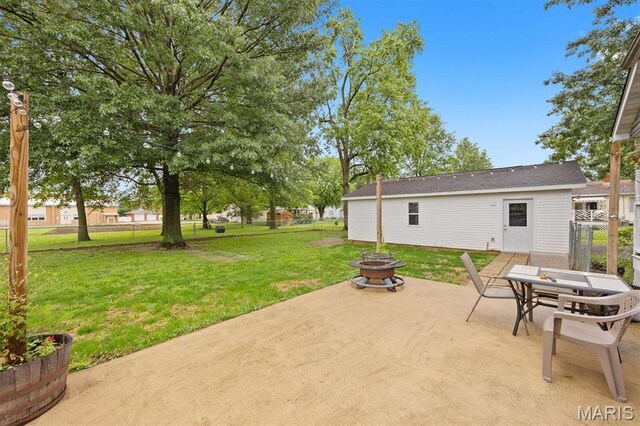 203 N Williams St, Albers, IL 62215 - view of patio featuring an outdoor fire pit