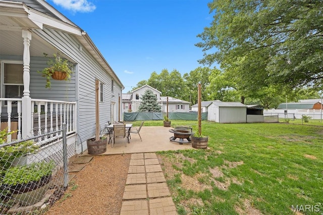 203 N Williams St, Albers, IL 62215 - view of yard with an outdoor fire pit and a patio area