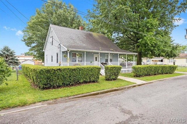 203 N Williams St, Albers, IL 62215 - view of front of property featuring covered porch, a chimney, and roof with shingles