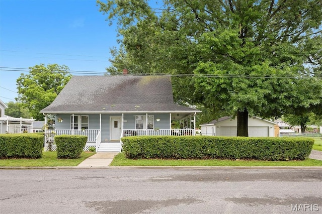 203 N Williams St, Albers, IL 62215 - view of front of home featuring a porch, a garage, and a shingled roof