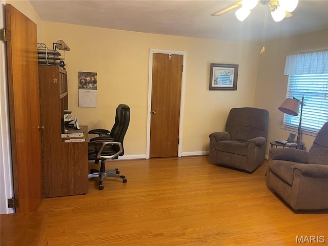 1034 Chelsea Ave, Glendale, MO 63122 - home office with light wood finished floors and a ceiling fan