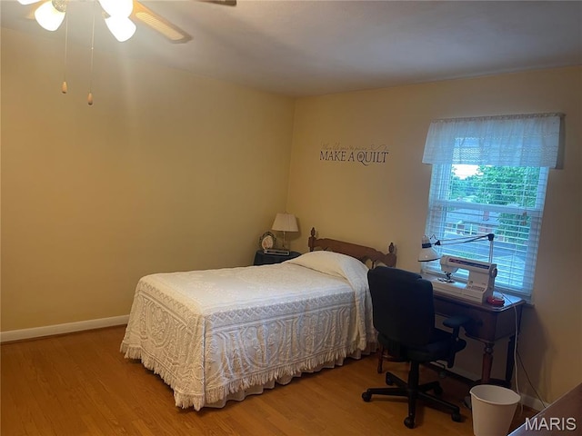 1034 Chelsea Ave, Glendale, MO 63122 - bedroom featuring wood finished floors and an office area