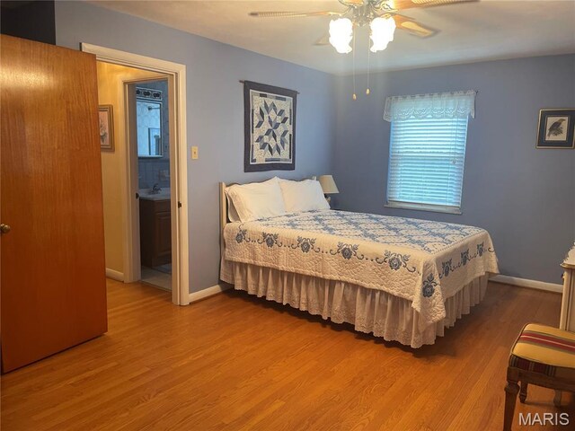 1034 Chelsea Ave, Glendale, MO 63122 - bedroom featuring wood finished floors and a ceiling fan