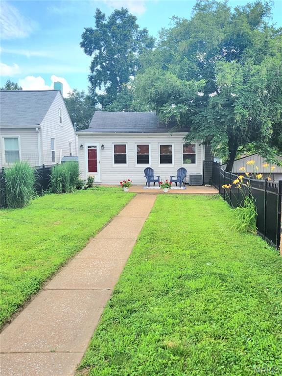 1928 Arsenal St, Saint Louis, MO 63118 - view of front of home featuring roof with shingles