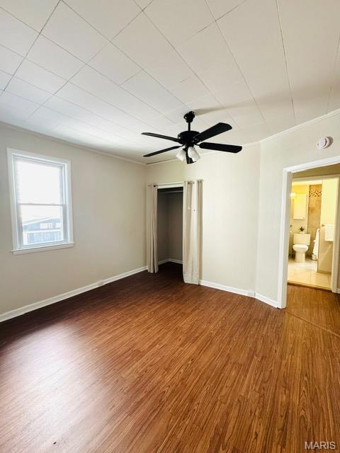 1928 Arsenal St, Saint Louis, MO 63118 - unfurnished room with wood finished floors, a ceiling fan, and crown molding