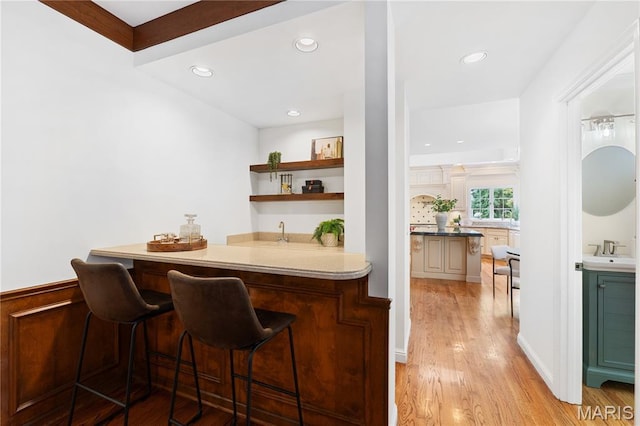 16427 Andraes Dr, Chesterfield, MO 63005 - indoor wet bar featuring light wood-style floors and recessed lighting