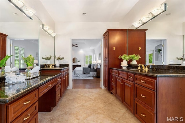 16427 Andraes Dr, Chesterfield, MO 63005 - full bath featuring connected bathroom, vanity, ceiling fan, and tile patterned flooring