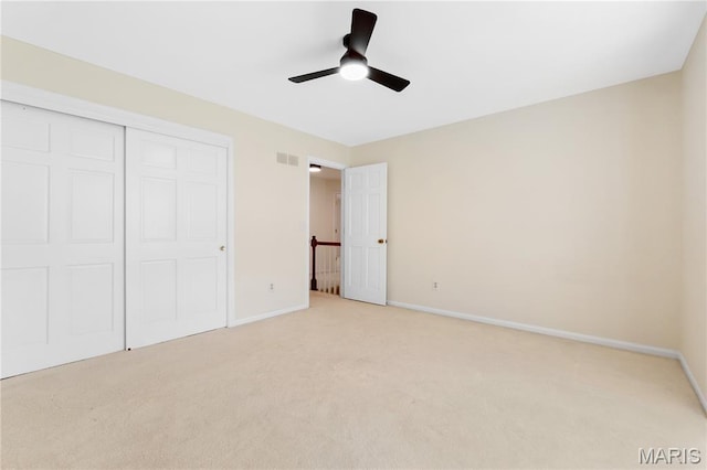 16427 Andraes Dr, Chesterfield, MO 63005 - unfurnished bedroom with light carpet, a closet, and a ceiling fan