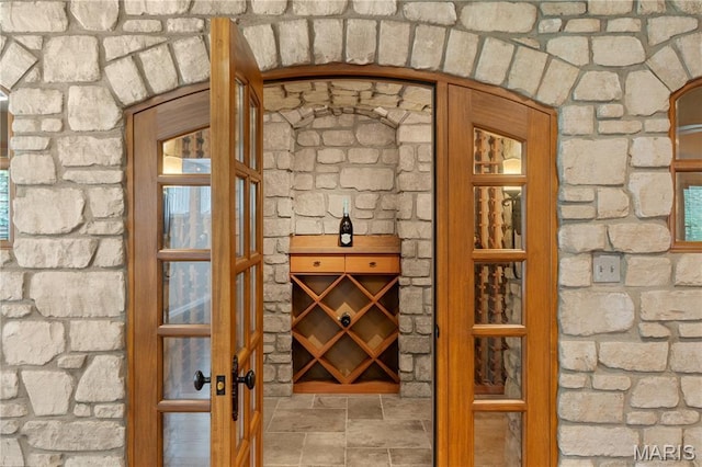 16427 Andraes Dr, Chesterfield, MO 63005 - wine area with stone finish flooring