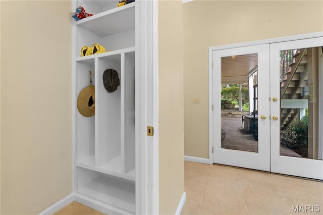 16427 Andraes Dr, Chesterfield, MO 63005 - mudroom with french doors and light tile patterned flooring