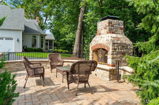16427 Andraes Dr, Chesterfield, MO 63005 - view of patio featuring an outdoor stone fireplace