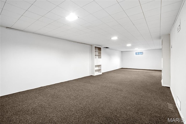 7 Flamingo Dr, Hazelwood, MO 63042 - basement featuring dark colored carpet and recessed lighting