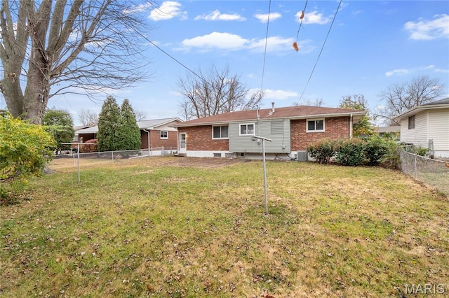7 Flamingo Dr, Hazelwood, MO 63042 - back of house featuring brick siding and a fenced backyard