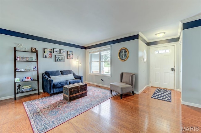 713 Settler Rd, Fenton, MO 63026 - living area featuring wood finished floors and crown molding