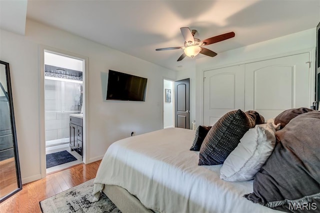 713 Settler Rd, Fenton, MO 63026 - bedroom with light wood finished floors, a closet, ceiling fan, and ensuite bathroom