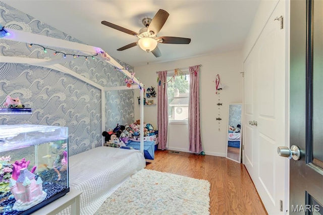 713 Settler Rd, Fenton, MO 63026 - bedroom with light wood-type flooring and a ceiling fan