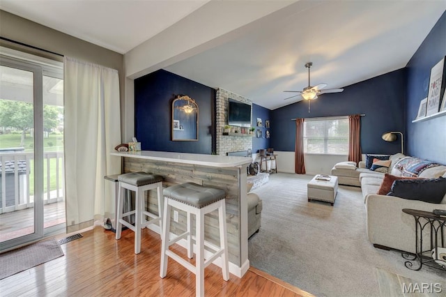 713 Settler Rd, Fenton, MO 63026 - living room featuring ceiling fan, wood finished floors, and vaulted ceiling
