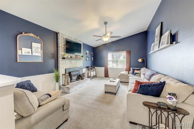 713 Settler Rd, Fenton, MO 63026 - carpeted living area with ceiling fan, a brick fireplace, and vaulted ceiling