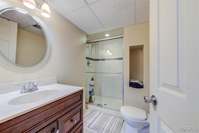 713 Settler Rd, Fenton, MO 63026 - bathroom featuring a shower stall, vanity, a drop ceiling, and tile patterned flooring