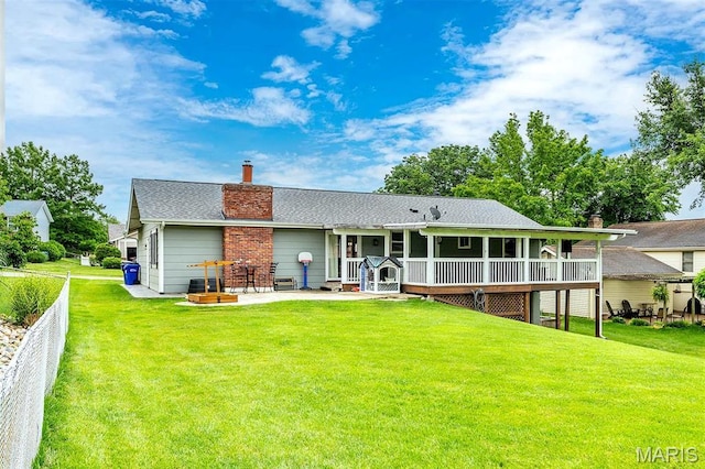 713 Settler Rd, Fenton, MO 63026 - rear view of house featuring a chimney, a patio area, an attached garage, roof with shingles, and a deck
