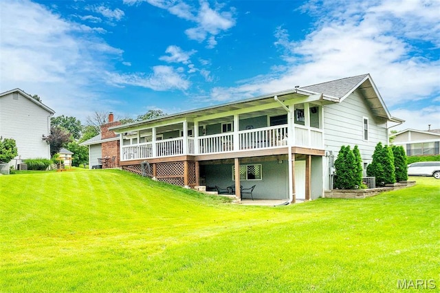 713 Settler Rd, Fenton, MO 63026 - rear view of property featuring a yard, a deck, and a patio area
