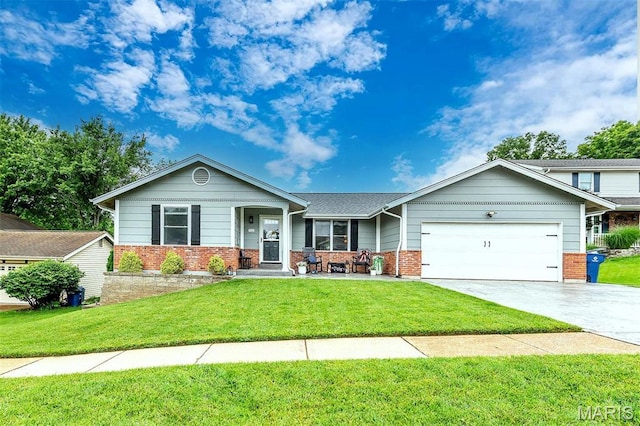 713 Settler Rd, Fenton, MO 63026 - view of front of home featuring brick siding, an attached garage, a front yard, and driveway